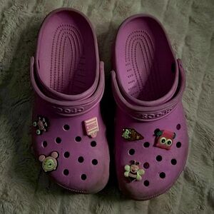 Hot pink CROCS, (croc charms shown are included).